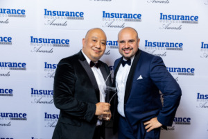 Gary Sim and Enrique Sicurella accept the Smart Nine Australian Brokerage of the Year Award 2022